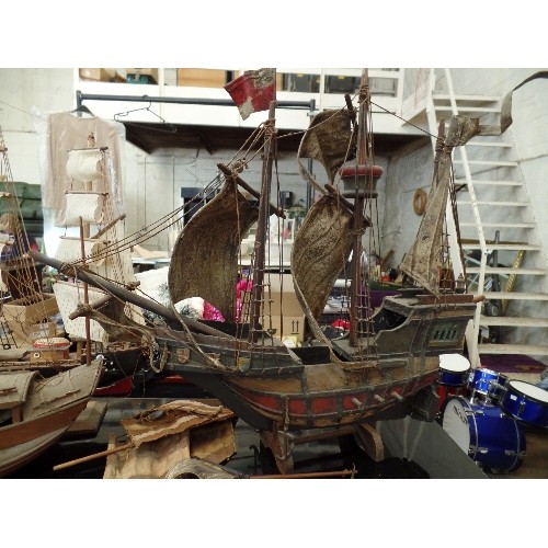 238 - A VINTAGE HAND-MADE WOODEN PIRATE SHIP/GALLEON, A SAILING SHIP AND A SMALLER SHIP. ON STANDS. ALSO A... 