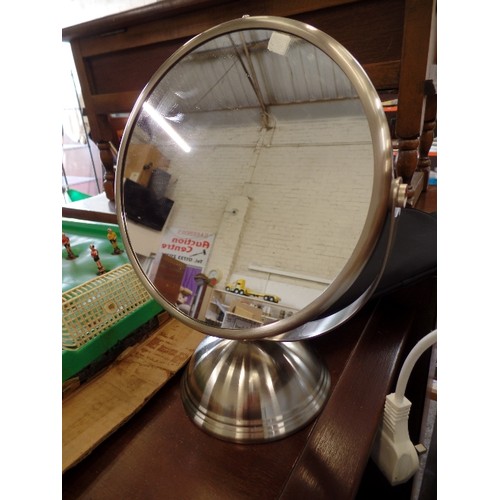 292 - CONTEMPORARY BRUSHED STEEL MAGNIFYING MIRROR/ CLOCK.