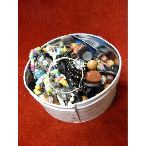 248 - TIN OF MIXED COSTUME JEWELLERY.