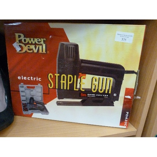 375 - POWER DEVIL ELECTRIC STAPLE GUN. PDA 33G. APPEARS UNUSED. WITH BOX.