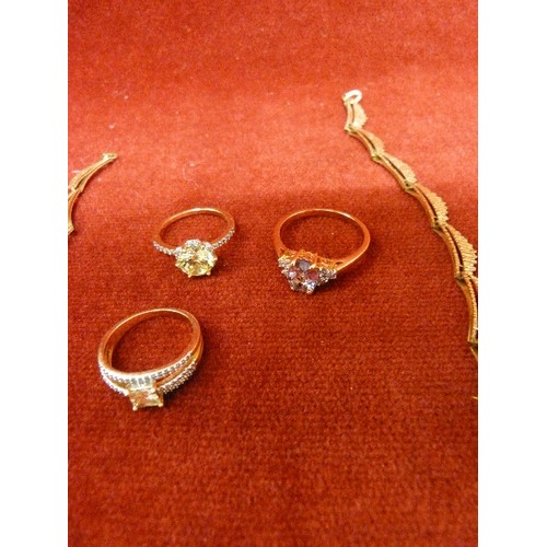 10 - LOVELY GOLD METAL NECKLACE AND 3 RINGS WITH GLASS STONES