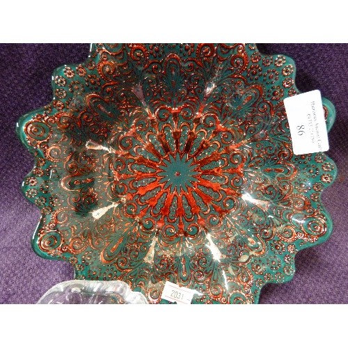 86 - UNUSUAL GLASS BOWL. ORNATELY DECORATED WITH 'SILVER' UNDERSIDE, GREEN BASE COLOUR AND RAISED RED MET... 