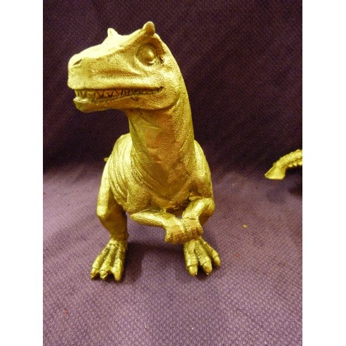 91 - 2 X GOLD PAINTED DINOSAUR PLANTERS. TO HOLD SMALL PLANT-POTS OR TRINKETS.