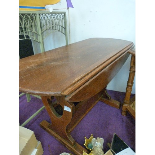 128 - VINTAGE WOOD BROTHERS 'OLD CHARM' TABLE WITH DROP LEAVES, AND MAGAZINE STORAGE.