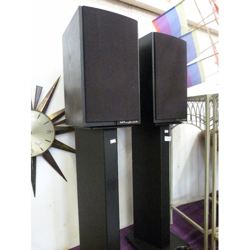 131 - PAIR OF WHARFEDALE SPEAKERS. ON TALL ATACAMA STANDS. BLACK. TOTAL HEIGHT 1M APPROX.