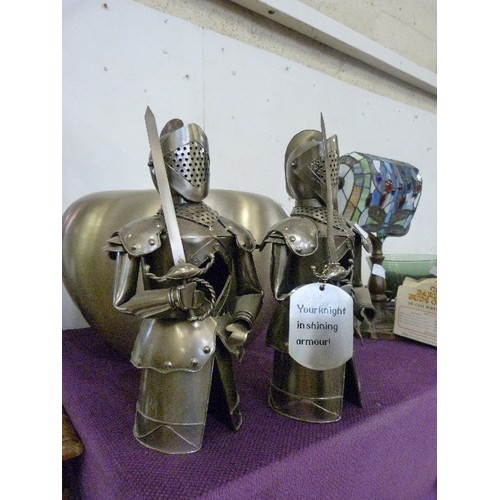 136 - PAIR OF TIN-PLATE WINE BOTTLE COVERS. KNIGHTS IN SHINING ARMOUR.