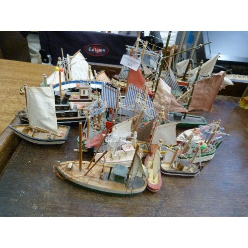 411 - COLLECTION OF SMALL WOODEN FISHING BOATS. APPROX X 22.