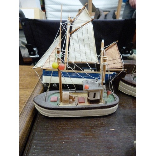 411 - COLLECTION OF SMALL WOODEN FISHING BOATS. APPROX X 22.