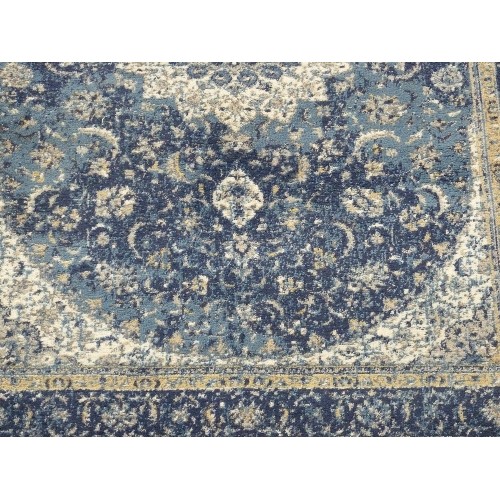 405 - 2 BLUE PATTERNED RUGS. A LARGE RECTANGULAR, AND A SMALLER MATCHING.