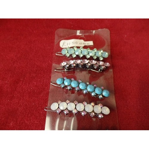 28 - A CARD OF BRIGHTLY COLOURED STONES HAIR SLIDES