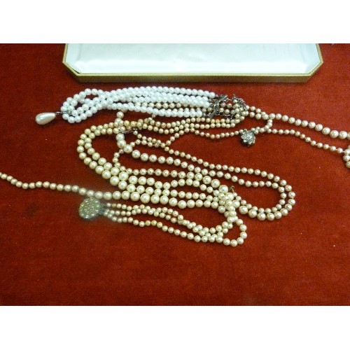 21 - BOX WITH VINTAGE SIMULATED PEARL NECKLACES INCLUDING A 3 STRAND NECKLACE WITH CLASP MARKED 