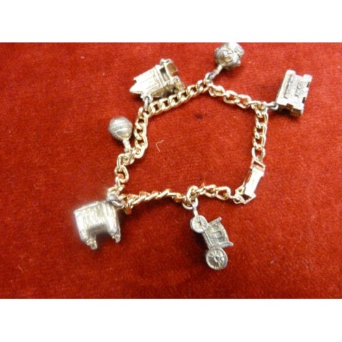 23 - VINTAGE CHARM BRACELET ON A GOLD METAL CHAIN AND AN ELEPHANT BRACELET