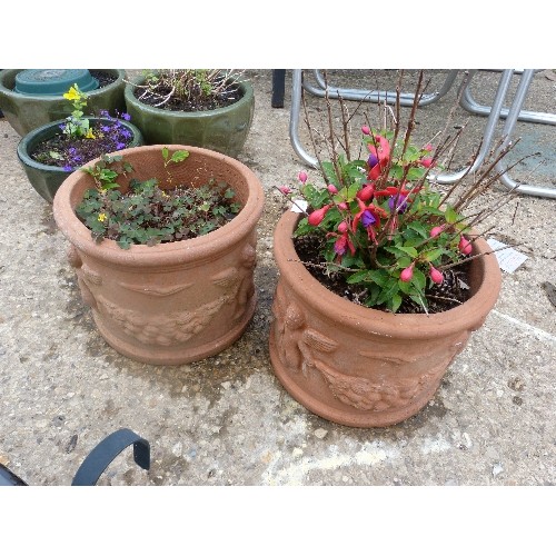 609 - PAIR OF TERRACOTTA PLANT POTS WITH CHERUB DECORATION ( 1 WITH FUCHSIA)