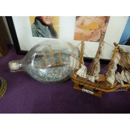 102A - 2 SMALL WOODEN BOAT MODELS AND A BOAT IN GLASS BOTTLE