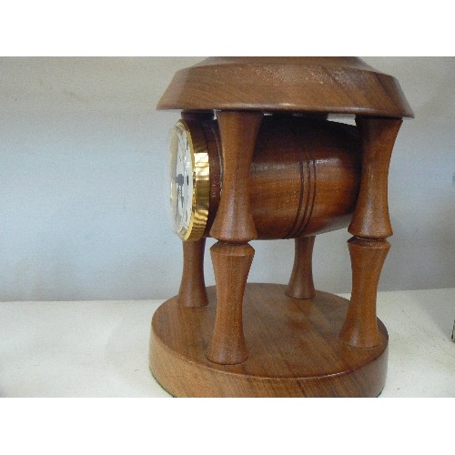 83 - GERMAN MADE CLOCK. SMALL BEER BARREL MANTEL CLOCK IN WOODEN FRAME.