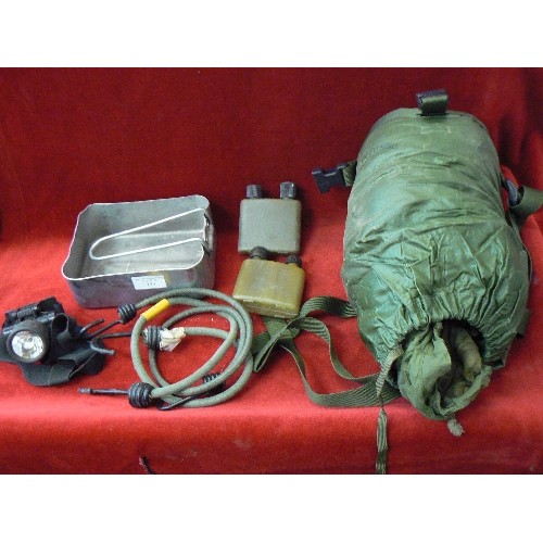 133 - COMPACT MILITARY SLEEPING BAG, HEAD-TORCH, ALUMINIUM COOK PAN, DRINKING FLASKS AND A BUNJEE. ALL KHA... 