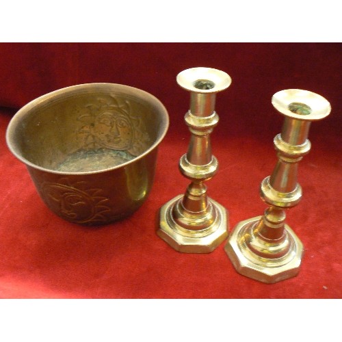 147 - BRASSWARE, 2 CANDLESTICKS, A PLANTER WITH RAISED SUNSHINE.