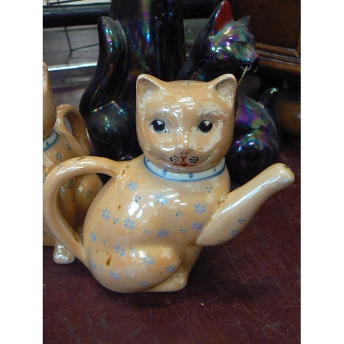 214 - IRRIDESCENT CAT FIGURES. THE SMALLER PAIR ARE DECANTERS.