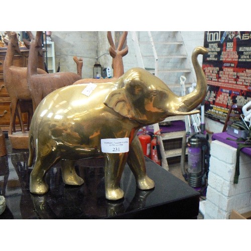 231 - LARGE BRASS ELEPHANT.