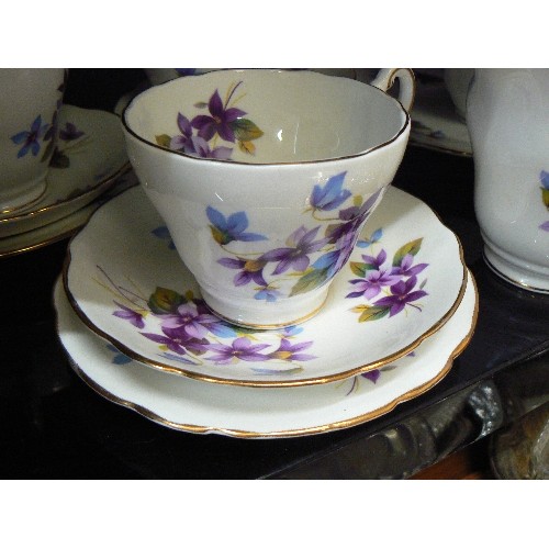 234 - CHINA TEA SET. 'MY FAIR LADY' GROSVENOR. JACKSON & GOSLING. MILK, SUGAR, CAKE PLATE. 6 X TRIOS. PURP... 