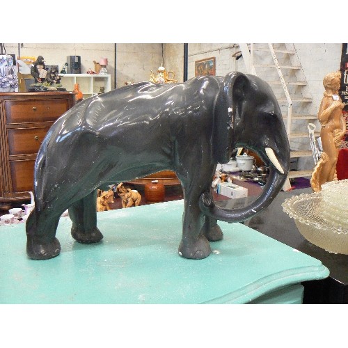 235 - LARGE GREY PAINTED PLASTER ELEPHANT.