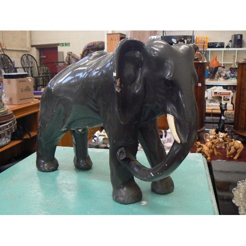 235 - LARGE GREY PAINTED PLASTER ELEPHANT.