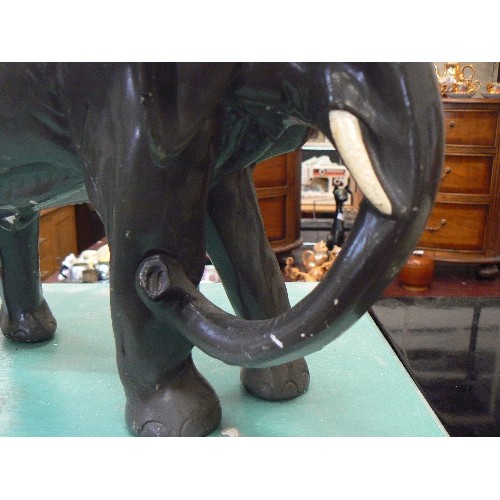 235 - LARGE GREY PAINTED PLASTER ELEPHANT.