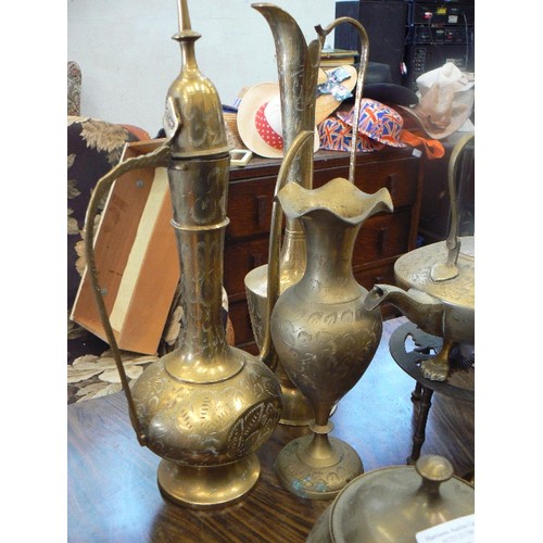 281 - INDIAN ETCHED BRASSWARE. TALL DECANTERS AND JUGS, TRIVET, TEAPOTS, ROSE BOWL ETC. 8 PCS.