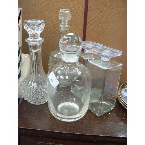 305 - 5 GLASS DECANTERS. 3 X PLAIN AND CONTEMPORARY, 2 X TRADITIONAL STYLE CUT GLASS. ALL WITH STOPPERS.