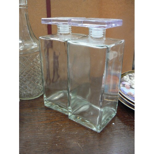 305 - 5 GLASS DECANTERS. 3 X PLAIN AND CONTEMPORARY, 2 X TRADITIONAL STYLE CUT GLASS. ALL WITH STOPPERS.