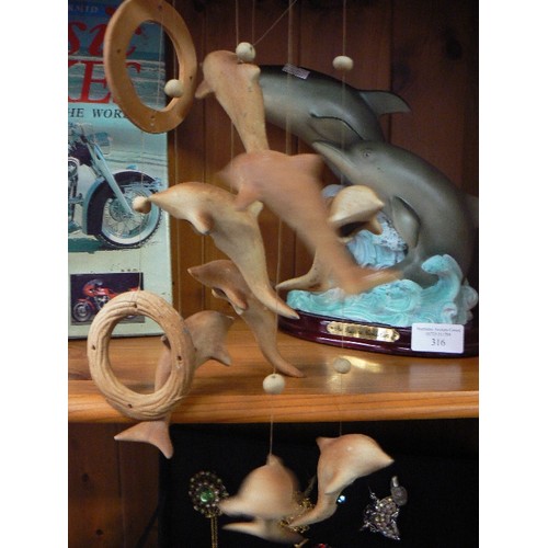 316 - LARGE DOLPHIN SCULPTURE BY JULIANA COLLECTION. ALSO A DOLPHIN WIND CHIME.