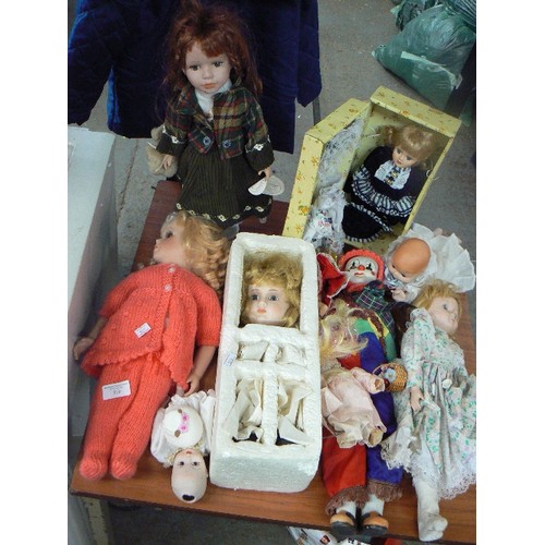 319 - PORCELAIN DOLL COLLECTION. INC A CLOWN, A BABY ETC.