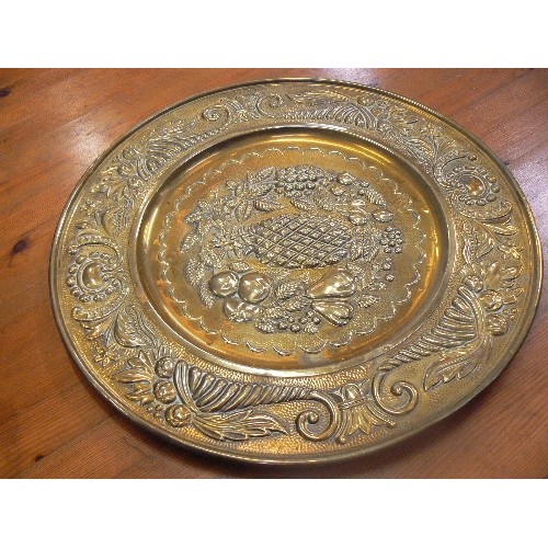 383 - 2 BRASS CHARGERS/PLATES. RAISED DETAIL. SHIRE HORSE, AND FRUIT.