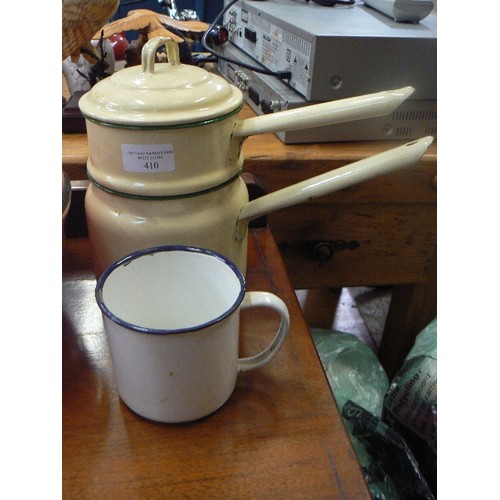 410 - VINTAGE ENAMEL-WARE. 2 SMALL STACKING SAUCEPANS IN CREAM/GREEN. AND A LARGE WHITE MUG.