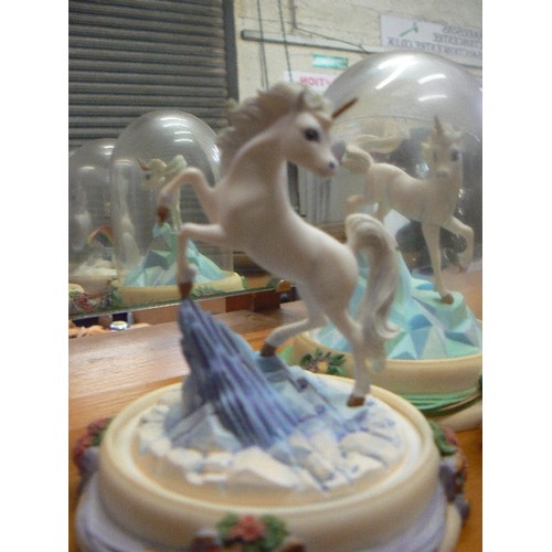 413 - UNICORNS. FRANKLIN MINT HAND-PAINTED LIMITED EDITION SCULPTURES IN GLASS DOMES.