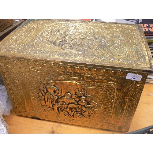 246 - BRASS COAL BOX. HINGED LID. CONTAINS HOUSEHOLD LINEN/CLOTHING.