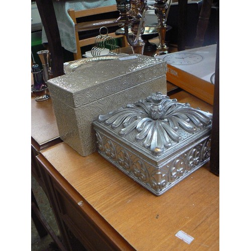 266 - 2 X CONTEMPORARY LIDDED BOXES. A CERAMIC WITH EMBOSSED GLAZE, AND A SILVER RESIN.