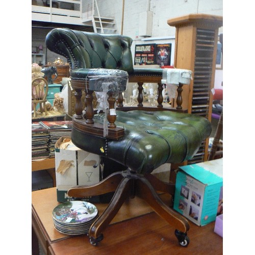 273 - DARK GREEN CAPTAINS CHAIR. LEATHER BUTTONED SEAT AND BACK. SWIVEL BASE ON CASTORS.