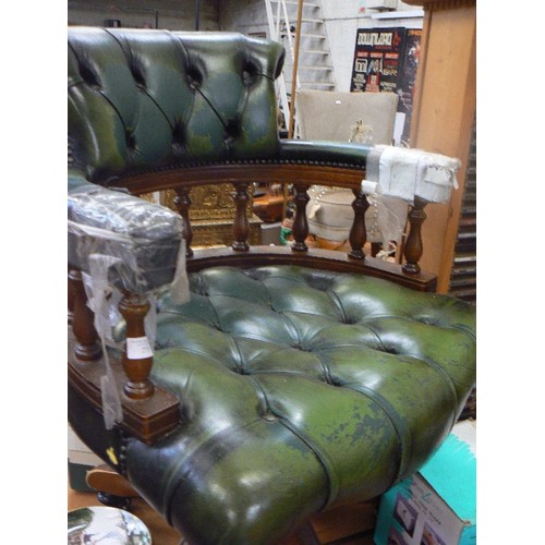 273 - DARK GREEN CAPTAINS CHAIR. LEATHER BUTTONED SEAT AND BACK. SWIVEL BASE ON CASTORS.