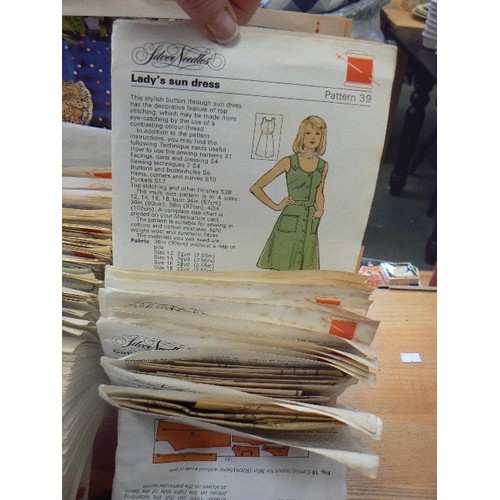 301 - QUANTITY OF VINTAGE SILVER NEEDLES SEWING PATTERNS. IN RETRO ORANGE PLASTIC SILVER NEEDLES CASE.