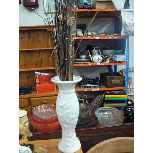 342 - TALL WHITE CERAMIC VASE CONTAINING GRASSES WITH BEADS.