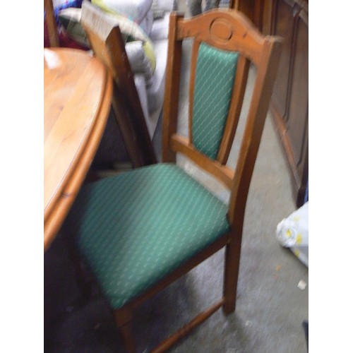 384 - DINING TABLE AND CHAIRS. DARK PINE OVAL TABLE. 4 MATCHING CHAIRS WITH GREEN UPHOLSTERED SEATS AND BA... 