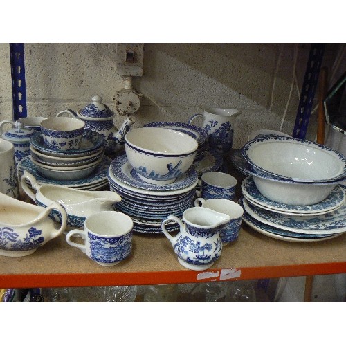 481 - LARGE QUANTITY OF BLUE AND WHITE CHINA INCLUDING WILLOW TREE, PLATES, BOWLS, TEAPOT, MILK JUGS ETC (... 