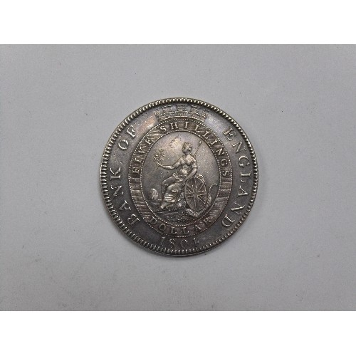 90 - A GEORGE III SILVER BANK OF ENGLAND EMERGENCY ISSUE DOLLAR, 1804, FIGURE OF BRITANNIA TO REVERSE AND... 