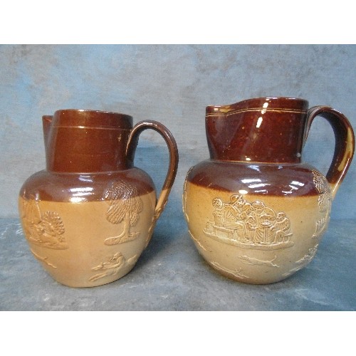 193 - A GRADUATED PAIR OF DOULTON LAMBETH STONEWARE JUGS