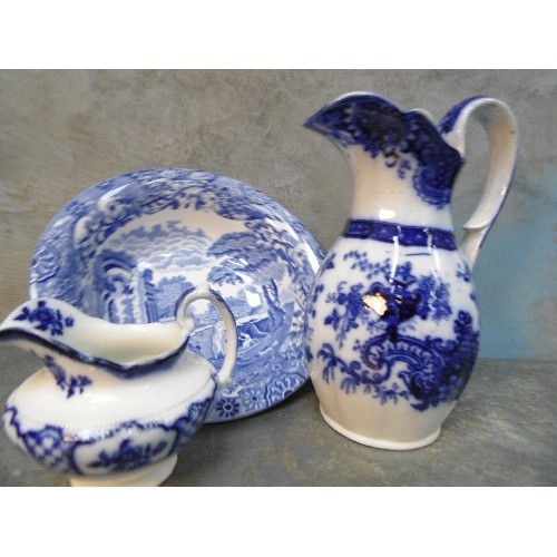 194 - TWO VICTORIAN FLOW BLUE JUGS AND A SPODE ITALIAN BOWL (OLD OVAL MARK)