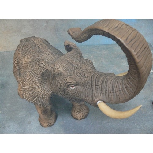 223 - A SUPERB LARGE PORCELAIN FIGURE OF AN ELEPHANT WITH TRUNK RAISED - MATT GLAZE FINISH - 45CM X 38CM