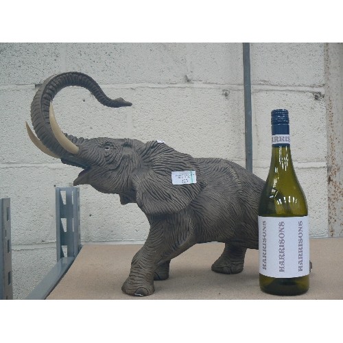 223 - A SUPERB LARGE PORCELAIN FIGURE OF AN ELEPHANT WITH TRUNK RAISED - MATT GLAZE FINISH - 45CM X 38CM