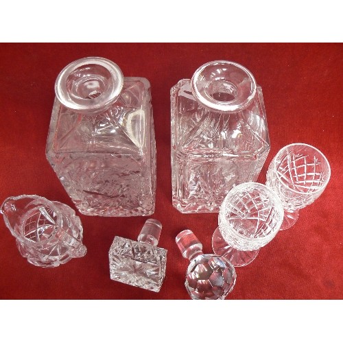 312 - TWO CUT GLASS SPIRIT DECANTERS WITH A PAIR OF WATERFORD CRYSTAL SHERRY GLASSES (ETCHED MARK TO FEET)... 