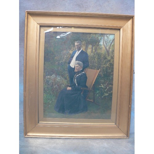 166 - A VERY GOOD EDWARDIAN ENHANCED PHOTOGRAPHIC PORTRAIT OF A COUPLE IN A GARDEN HIGHLIGHTED WITH OIL PA... 